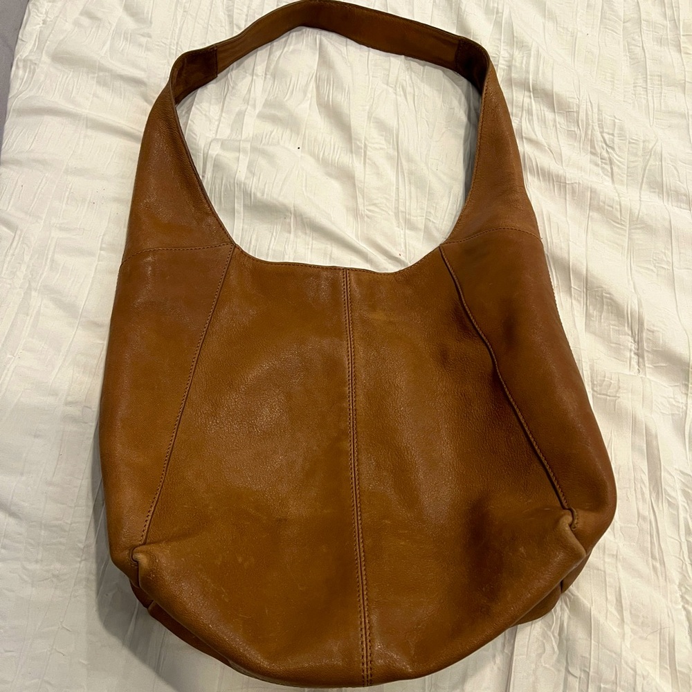 Lucky handbag genuine leather.  Gorgeous brown neutral color!